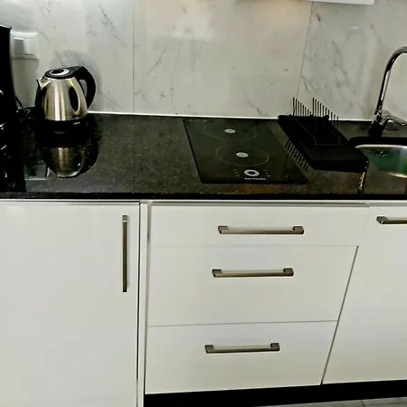 Under The Palm Плая-де-лас-Америкас